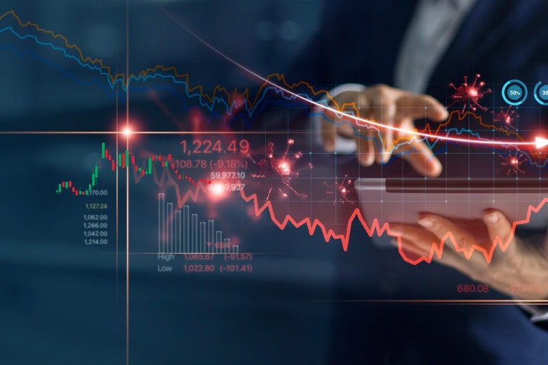 economic crisis businessman using tablet analyzing sales data and economic growth